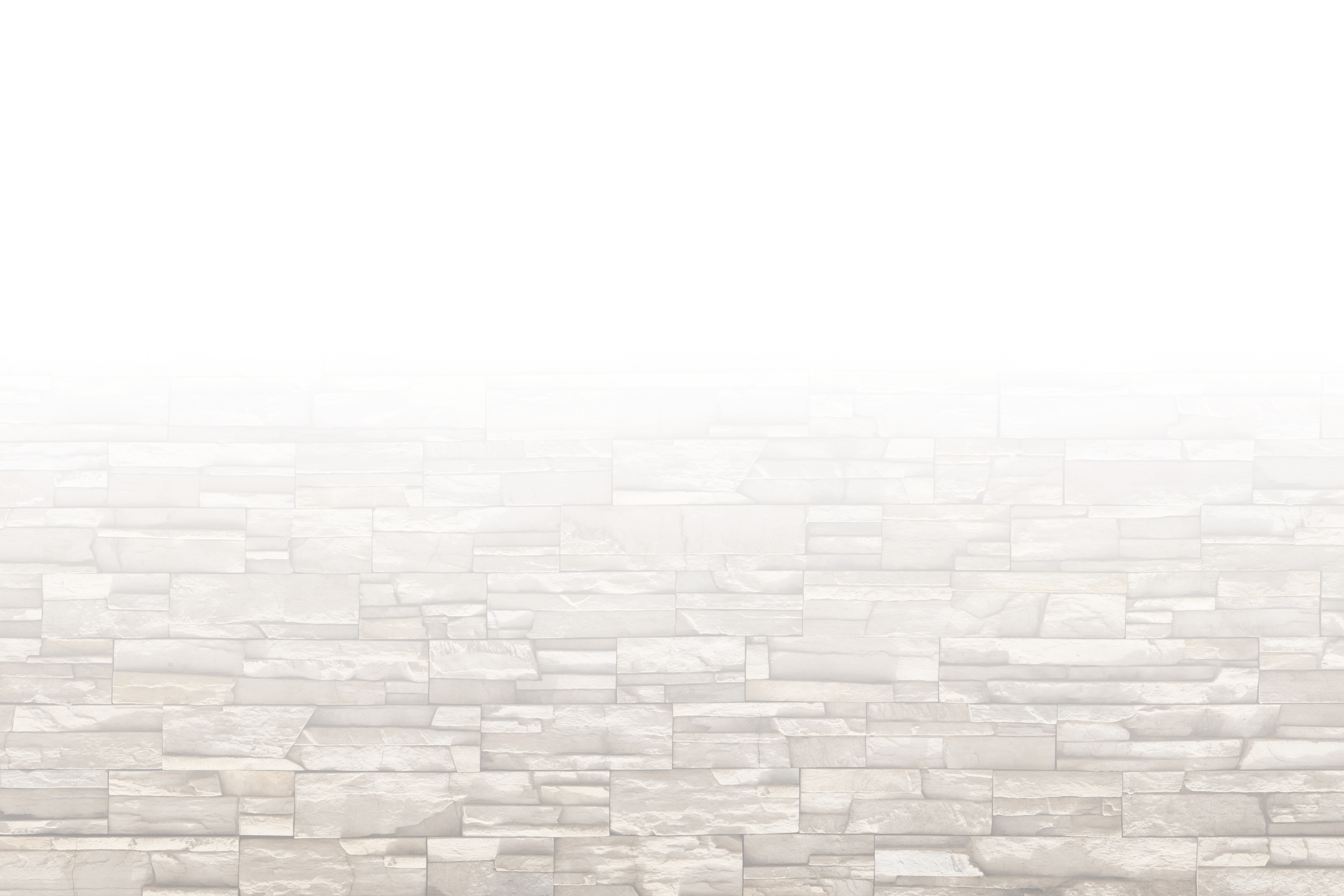 A person walks along a paved street surrounded by historic buildings, including the Colosseum, against a clear sky with scattered clouds.